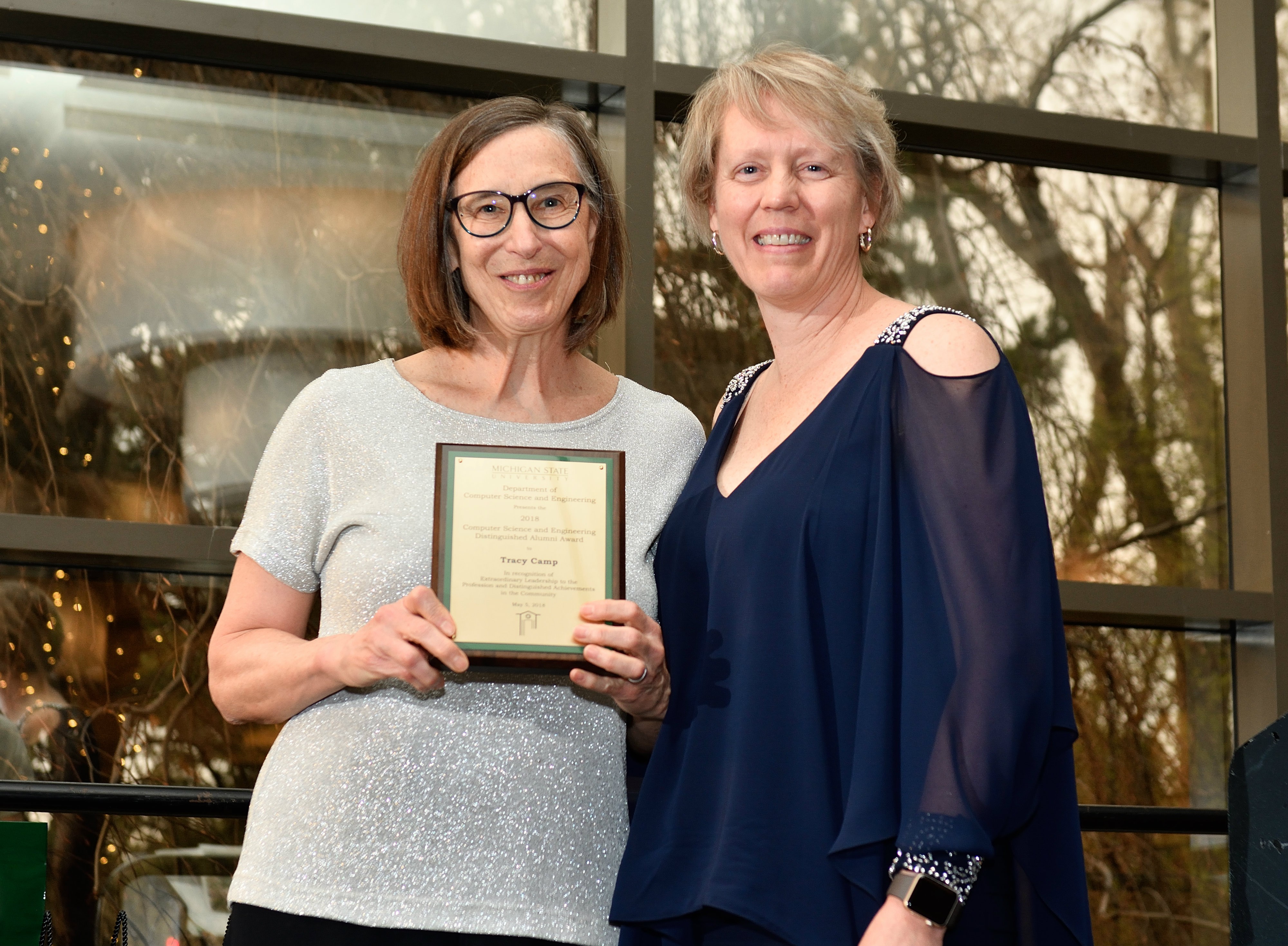 Camp receives distinguished alumni award from alma mater